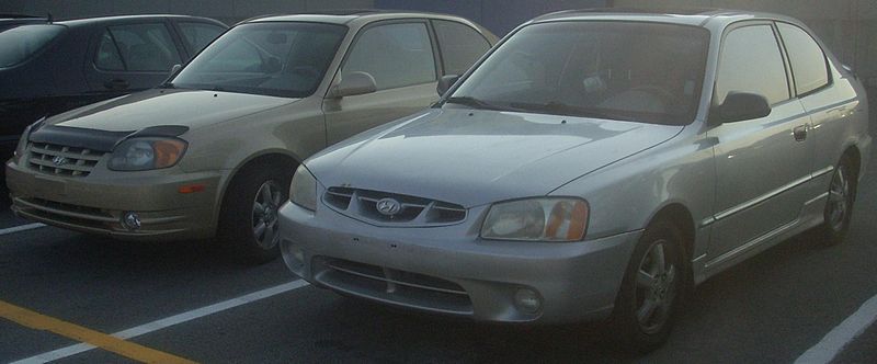 File:'00-'02 & '03-'06 Hyundai Accent Hatchs.JPG
