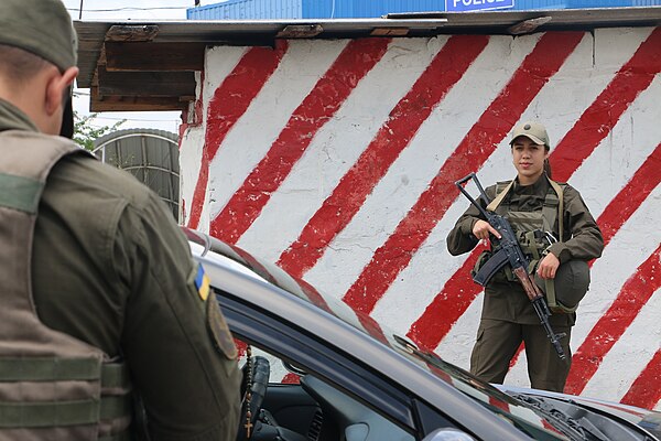 Female soldier of the NGU at a security checkpoint