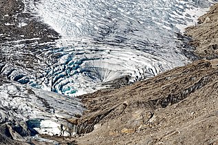 Ice collapse, glacier Pasterze, Austria.