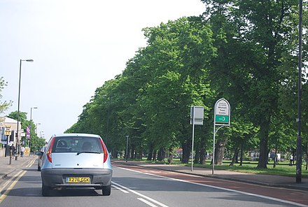The A217, passing Figges Marsh in Mitcham