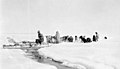A tide crack is crossed, with a sled used as a bridge, Coronation Gulf, Nunavut Une crevasse due à la marée est franchie à l’aide d’un traîneau servant de pont, golfe du Couronnement, Nunavut (49165287711).jpg