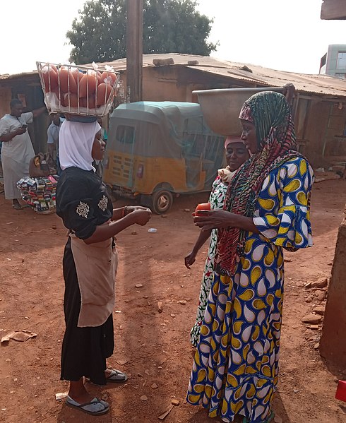 File:A young Ghanaian Girl Selling Ice Kaafa.jpg