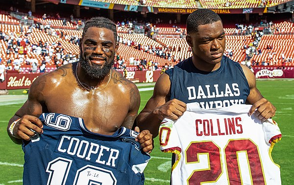 Collins alongside Amari Cooper following a game against the Dallas Cowboys in 2019.