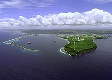 Point Udall (Orote Point) is the headland on the right in this view of Apra Harbor's mouth