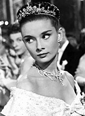 A snapshot of actress Audrey Hepburn in her role as Princess Ann in the film Roman Holiday.