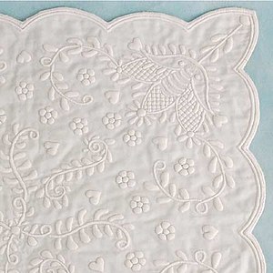 Detail of a white cotton Provençal, or boutis, quilting