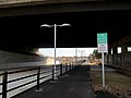 CTfastrak busway, bike route beginning, and Harry Truman Overpass, December 2014.JPG