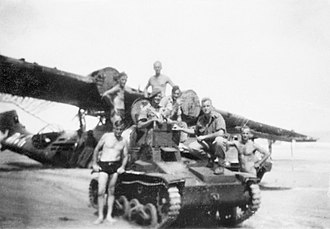 A Type 92 Japanese tankette captured by soldiers of the 2/9th Battalion, 1 July 1945. Captured Japanese Type 92 tankette Borneo 1945 AWM P02125.001.jpg