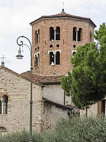 The tiburium, reminiscent of those in Lombard Romanesque style, of St. Stephen's Church Chiesa di Santo Stefano - esterno (1).jpg