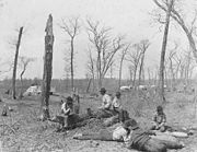 Chippewa people playing the moccasin game at Mille Lacs Indian Reservation, c. 1885