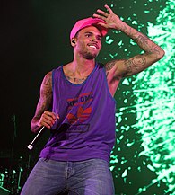 Chris Brown was featured on the song "Throwback". Chris Brown, 2012.jpg