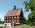 Ehem. Forsthof (Friesenhof) mit Herrenhaus, Torhaus und zwei Seitengebäuden, Gärtnerhaus (Einzeldenkmal zu ID-Nr. 09305822)