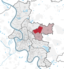 Dyusseldorf xaritasi, Lyudenberg (qizil rangda) 7-tuman ichida (pushti rangda) ko'rsatilgan