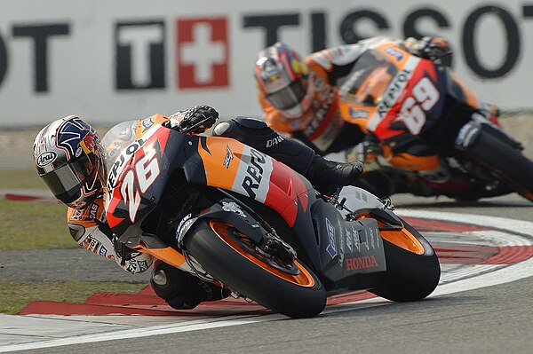 Dani Pedrosa and Nicky Hayden, riding their Honda's in the MotoGP race. They went on to finish first and second, which was Pedrosa's first victory in 