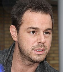 Danny Dyer was cast as Mick Carter in 2013. Danny Dyer at Upton Park, 02 Oct 2010 (cropped).jpg