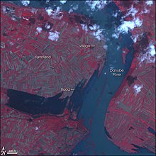 The Danube spills over into farm fields in the northeastern corner of Serbia in this image, taken by the ASTER on NASA's Terra satellite on April 24, 2006. Danube flooding Serbia Apr2006.jpg