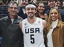 Stockton with his parents in 2022 David Stockton and parents (51911666255) (cropped).jpg