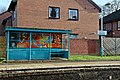 One of the two decorated waiting shelters.