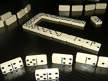 A game of dominoes Dominospiel.JPG