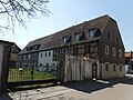 Residential stable house with courtyard wall, gate entrance and gate