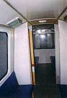 Interior de coche intermedio, 2003