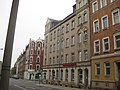 Apartment house designed as a closed development, in a corner location