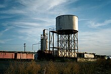 A water tower on the Camas Prairie Railroad in Lewiston, ID. Fat tank near Camas Prairie Railroad, Lewiston, ID. 2002 (10900113005).jpg
