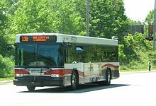 GPTC bus with bike rack, passing through the Indiana Dunes National Lakeshore in Miller Beach GPTC Grand.jpg