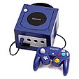 Purple video game console and controller