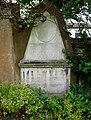 Gravestones along the churchyard wall around the Church of Saint George in Gravesend.