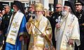 Greek Orthodox Clergy and cops.jpg
