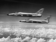 VF-211 F-11Fs in 1959 Grumman F11F-1 Tigers of VF-211 in flight 1959.jpg