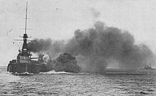 Monarch firing her main battery, before 1915 Gws monarch 01.jpg