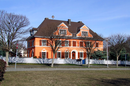 Apartment building with enclosure wall