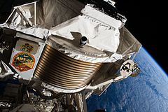 ISS-50 EVA-1 (b) Spectrometru magnetic alfa.jpg