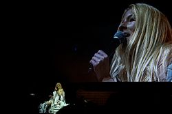 iamamiwhoami's first concert before a live audience at Way Out West portrayed their unconventional performance style and featured Lee singing to the audience on a bed made of toilet rolls. The audience being filmed and projected, watching themselves during the concert.
The appearance continues the events in the videos of ; john and clump that were released simultaneously to the Way out west performance.