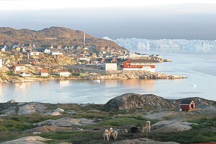 Ilulissat with the ice fjord in the background