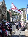 Crowds at the Island Games 2011 men's Town Centre Criterium cycling event, which took place in a loop around the High Street and Albert Street in Ventnor, Isle of Wight.