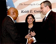 HUD Secretary Alphonso Jackson administering the Oath of Office to HUD General Counsel Keith Gottfried (pictured in middle holding a Bible is Cindy Gottfried) KGottfried Taking the Oath-120705.jpg