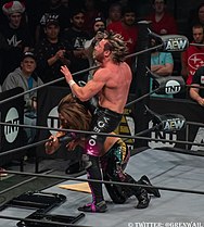 Kenny Omega performs the V-Trigger 03.jpg