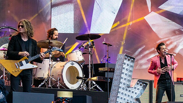 The Killers in 2017. From left to right: Dave Keuning, Ronnie Vannucci Jr., and Brandon Flowers