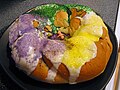 King's Cake frå Louisiana, med Jesusfigur i midten