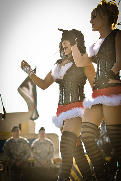 McCool (right) with Layla as LayCool at the 2010 Tribute to the Troops event