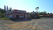 A motel from the area's boom days, now abandoned Lighthouse Inn Nikiski.jpg