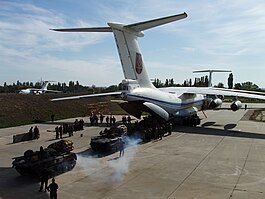 Завантаження 3 одиниць БМД-1 зі складу 25 ОПДБр в літак Іл-76 на військовому аеродромі «Мелітополь». 19 вересня 2006.