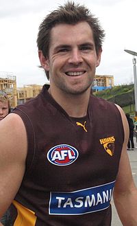 Luke Hodge, the first pick in the 2001 AFL draft. Hodge has played the most VFL/AFL games of any number-one draft pick (346 games played), is the only number-one draft pick to win a Norm Smith Medal, is one of just three number-one draft picks to have won a premiership, and has won the most premierships of any number-one draft pick (4) Luke Hodge 2008.jpg