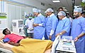 M. Venkaiah Naidu interacting with a patient after inaugurating the dialysis block in SVIMS Tirupathi, Chitoor district in Andhra Pradesh.jpg