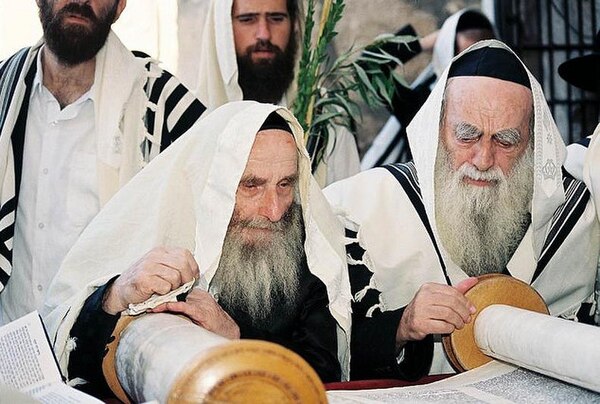 Haredi Jewish men during a Torah reading