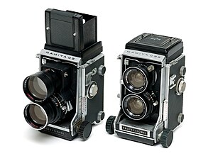 Mamiya twin-lens reflex cameras for 120/220 rollfilm. The two cameras shown in this image are the C3 and C33.