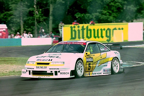 Manuel Reuter - Opel Team Joest - Opel Calibra V6 exits The Esses, Donington Park 1994 DTM